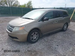 2013 Honda Odyssey EX-L with VIN 5FNRL5H65DB064238, listed as a IAAI auction lot 42050743 with 189,437 mi miles and . Bid and sale history available at carsss.com. Image 19.