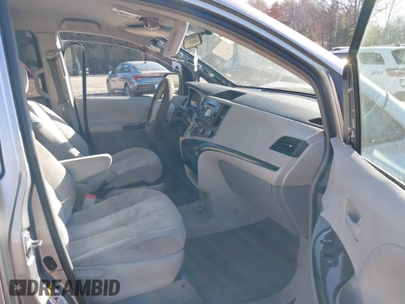 2012 Toyota Sienna with VIN 5TDKA3DC7CS015592, listed as a IAAI auction lot 40839775 with 161,944 mi miles and . Bid and sale history available at DreamBid. Image 5.