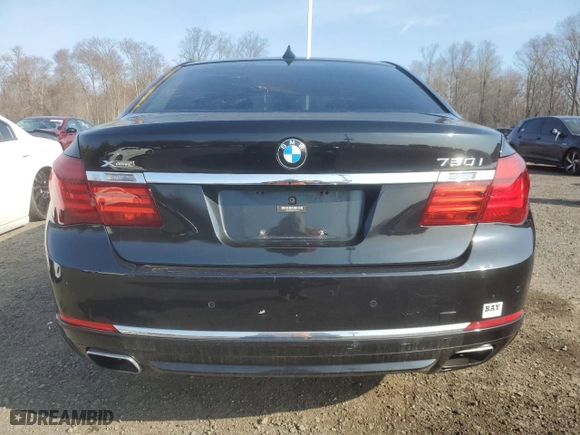 2013 BMW 7 Series 750i xDrive with VIN WBAYB6C52DD224129, listed as a Copart auction lot 52752605 with 122,275 mi miles and Clean Title. Bid and sale history available at carsss.com. Image 6.