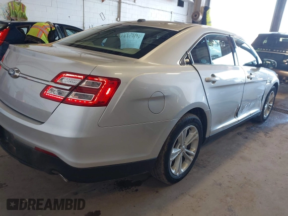2015 Ford Taurus SE with VIN 1FAHP2D82FG183546, listed as a IAAI auction lot 41915780 with 72,773 mi miles and . Bid and sale history available at carsss.com. Image 4.