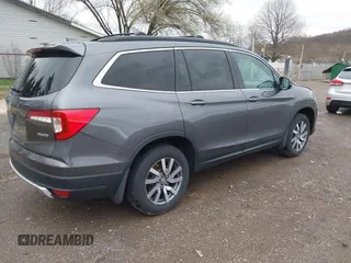 2020 Honda Pilot EX-L z VIN 5FNYF6H53LB059294, wystawiony jako IAAI lot #41910511 z przebiegiem 55 737 mil mil oraz . Historia ofert i sprzedaży dostępna na DreamBid. Obrazek 4.