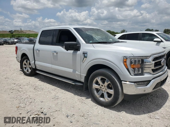 2021 Ford F-150 XL with VIN 1FTEW1CP2MKE62928, listed as a Copart auction lot 59882525 with 32,481 mi miles and Salvage title. Bid and sale history available at DreamBid. Image 4.