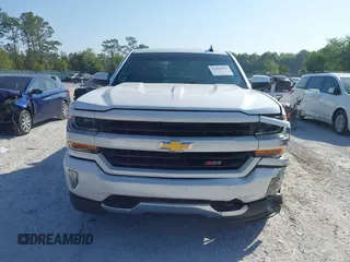 2017 Chevrolet Silverado 1500 LT with VIN 3GCUKREC4HG364108, listed as a IAAI auction lot 42050014 with 148,691 mi miles and . Bid and sale history available at DreamBid. Image 12.