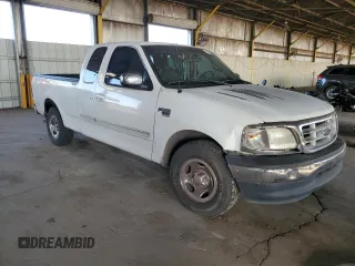 2000 Ford F-150 XL with VIN 1FTRX17W1YNB88948, listed as a Copart auction lot 83114404 with 288,100 mi miles and Salvage Title. Bid and sale history available at carsss.com. Image 4.