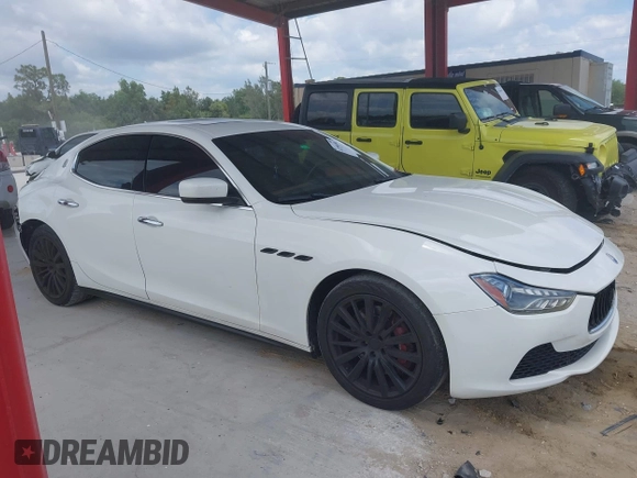 2016 Maserati Ghibli S with VIN ZAM57RSA3G1171238, listed as a IAAI auction lot 42290180 with 117,738 mi miles and . Bid and sale history available at DreamBid. Image 13.