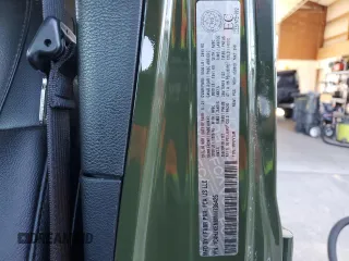 2021 Jeep Wrangler Unlimited Sahara Altitude z VIN 1C4HJXEN8MW736426, wystawiony jako Copart lot #50145245 z przebiegiem 30 938 mil mil oraz Szkoda całkowita • Salvage title. Historia ofert i sprzedaży dostępna na DreamBid. Obrazek 14.