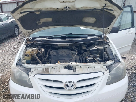 2005 Mazda MPV LX with VIN JM3LW28J650556302, listed as a IAAI auction lot 41775254 with 263,789 mi miles. Bid and sale history available at carsss.com. Image 10.
