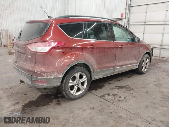 2014 Ford Escape SE with VIN 1FMCU9GXXEUD96930, listed as a IAAI auction lot 41574851 with 140,252 mi miles. Bid and sale history available at carsss.com. Image 4.
