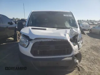 2016 Ford Transit Wagon XL with VIN 1FMZK1YM9GKB28861, listed as a Copart auction lot 77015814 with 111,384 mi miles and Salvage Title. Bid and sale history available at carsss.com. Image 5.