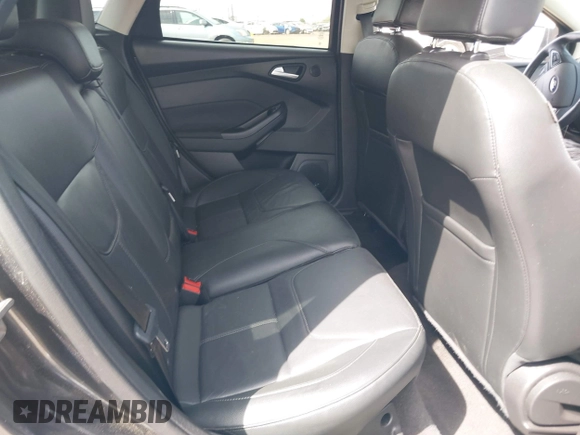 2018 Ford Focus Titanium with VIN 1FADP3N23JL241453, listed as a IAAI auction lot 42025190 with 90,174 mi miles and . Bid and sale history available at DreamBid. Image 8.