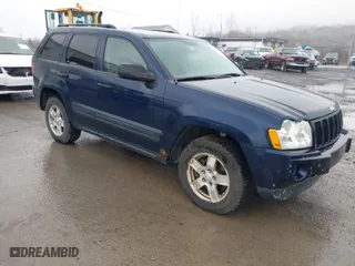 2006 Jeep Grand Cherokee Laredo with VIN 1J4GR48KX6C135070, listed as a IAAI auction lot 41966282 with 142,833 mi miles. Bid and sale history available at carsss.com. Image 1.
