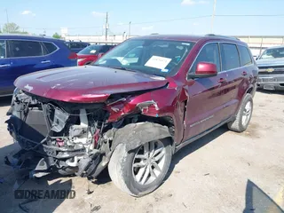 2017 Jeep Grand Cherokee Laredo with VIN 1C4RJEAG4HC674921, listed as a IAAI auction lot 41876971 with 115,773 mi miles. Bid and sale history available at carsss.com. Image 18.