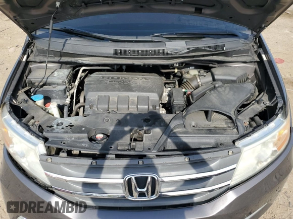 2012 Honda Odyssey Touring with VIN 5FNRL5H92CB134917, listed as a Copart auction lot 54437875 with 139,318 mi miles and Salvage Title. Bid and sale history available at DreamBid. Image 12.