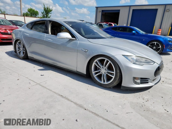 2013 Tesla Model S with VIN 5YJSA1CG5DFP03704, listed as a Copart auction lot 65143565 with Not provided miles and Clean title. Bid and sale history available at DreamBid. Image 4.