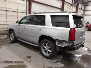 2015 Chevrolet Tahoe LT z VIN 1GNSKBKC7FR255956, wystawiony jako IAAI lot #42310560 z przebiegiem 215 968 mil mil oraz . Historia ofert i sprzedaży dostępna na DreamBid. Obrazek 3.