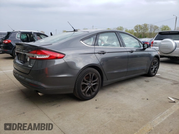 2018 Ford Fusion SE z VIN 3FA6P0HD8JR245391, wystawiony jako Copart lot #53571445 z przebiegiem 158 138 mil mil oraz Czysty tytuł • Clean title. Historia ofert i sprzedaży dostępna na DreamBid. Obrazek 3.