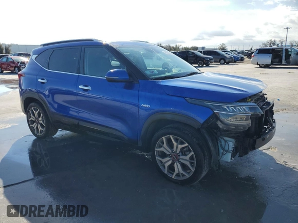 2021 Kia Seltos SX with VIN KNDETCA21M7072840, listed as a Copart auction lot 44395235 with 56,496 mi miles and Salvage Title. Bid and sale history available at carsss.com. Image 4.