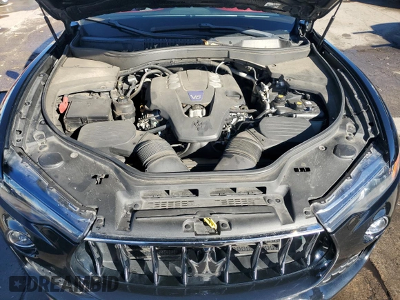 2017 Maserati Levante S z VIN ZN661YUL9HX199934, wystawiony jako Copart lot #83960574 z przebiegiem 75 078 mil mil oraz Szkoda całkowita • Salvage title. Historia ofert i sprzedaży dostępna na DreamBid. Obrazek 12.