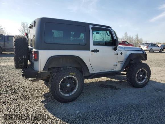 2012 Jeep Wrangler Sport z VIN 1C4AJWAG3CL151885, wystawiony jako Copart lot #51682175 z przebiegiem 111 544 mil mil oraz Szkoda całkowita • Salvage title. Historia ofert i sprzedaży dostępna na DreamBid. Obrazek 3.