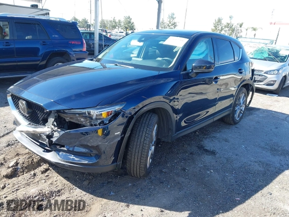2020 Mazda CX-5 Grand Touring with VIN JM3KFBDM8L0807555, listed as a IAAI auction lot 41612906 with 40,518 mi miles. Bid and sale history available at carsss.com. Image 17.