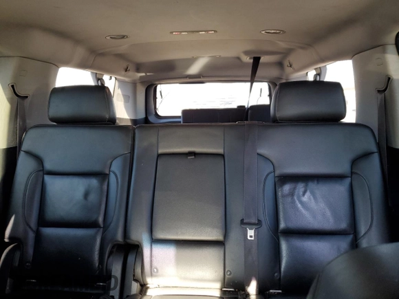 2015 Chevrolet Suburban LT with VIN 1GNSKJKC2FR274506, listed as a Copart auction lot 87881695 with 196,506 mi miles and Salvage Title. Bid and sale history available at DreamBid. Image 10.
