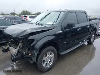 2015 Ford F-150 XLT with VIN 1FTEW1EGXFKD34324, listed as a IAAI auction lot 41901462 with 186,489 mi miles. Bid and sale history available at carsss.com. Image 2.