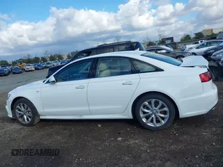 2018 Audi A6 Premium with VIN WAUC8AFC0JN097103, listed as a IAAI auction lot 41399918 with 115,014 mi miles. Bid and sale history available at carsss.com. Image 14.