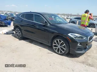 2018 BMW X2 xDrive28i with VIN WBXYJ5C33JEF80454, listed as a IAAI auction lot 41876188 with 34,596 mi miles. Bid and sale history available at carsss.com. Image 1.