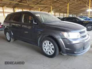 2014 Dodge Journey American Value with VIN 3C4PDCAB2ET301688, listed as a Copart auction lot 54731275 with 108,064 mi miles and Salvage Title. Bid and sale history available at DreamBid. Image 4.
