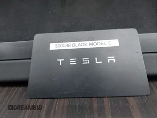 2023 Tesla Model S with VIN 5YJSA1E52PF500088, listed as a IAAI auction lot 41372918 with Not provided miles and . Bid and sale history available at DreamBid. Image 11.