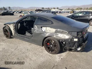 2024 BMW 4 Series M440i with VIN WBA83AP01RCP30000, listed as a Copart auction lot 77032014 with 14,671 mi miles and Salvage Title. Bid and sale history available at carsss.com. Image 2.