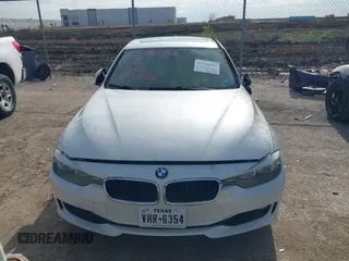 2014 BMW 3 Series 328i with VIN WBA3C1C59EK108868, listed as a IAAI auction lot 41108653 with Not Provided miles and . Bid and sale history available at carsss.com. Image 12.