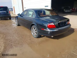 2003 Jaguar S-Type with VIN SAJEA01T43FM88318, listed as a IAAI auction lot 41290433 with 1 mi miles. Bid and sale history available at carsss.com. Image 3.