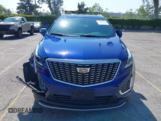 2023 Cadillac XT5 FWD Premium Luxury z VIN 1GYKNCRS3PZ176654, wystawiony jako IAAI lot #42136259 z przebiegiem 20 403 mil mil oraz . Historia ofert i sprzedaży dostępna na DreamBid. Obrazek 13.