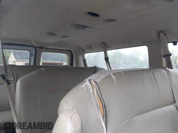 2014 Ford Econoline Passenger XL with VIN 1FBNE3BL4EDA97935, listed as a IAAI auction lot 42187031 with 228,696 mi miles. Bid and sale history available at carsss.com. Image 8.