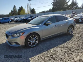 2014 Mazda 6 i Touring with VIN JM1GJ1V64E1119430, listed as a Copart auction lot 53205715 with 173,347 mi miles and Clean Title. Bid and sale history available at DreamBid. Image 1.