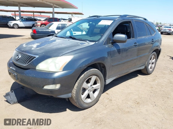 2004 Lexus RX 330 with VIN JTJGA31U340001595, listed as a IAAI auction lot 42125099 with 238,834 mi miles. Bid and sale history available at carsss.com. Image 2.