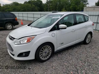 2016 Ford C-Max Energi SEL with VIN 1FADP5CUXGL117043, listed as a Copart auction lot 63949323 with 86,944 mi miles. Bid and sale history available at carsss.com. Image 1.