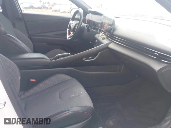 2023 Hyundai Elantra N Line z VIN KMHLR4AF5PU377340, wystawiony jako IAAI lot #42153338 z przebiegiem 50 314 mil mil oraz . Historia ofert i sprzedaży dostępna na DreamBid. Obrazek 5.