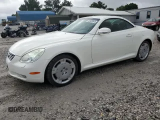 2002 Lexus SC 430 with VIN JTHFN48Y020031831, listed as a Copart auction lot 60928345 with 97,935 mi miles and Salvage title. Bid and sale history available at DreamBid. Image 1.