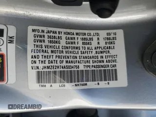 2010 Honda Insight EX z VIN JHMZE2H74AS034758, wystawiony jako Copart lot #52905445 z przebiegiem 154 148 mil mil oraz Szkoda całkowita • Salvage title. Historia ofert i sprzedaży dostępna na DreamBid. Obrazek 12.
