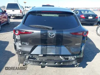 2022 Mazda CX-30 S Select with VIN 3MVDMBBL2NM442323, listed as a IAAI auction lot 41765707 with 40,848 mi miles and . Bid and sale history available at DreamBid. Image 6.