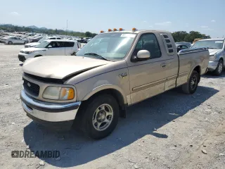 1998 Ford F-150 XL with VIN 1FTRX17LXWNC09671, listed as a Copart auction lot 69014494 with 254,034 mi miles and Clean title. Bid and sale history available at DreamBid. Image 1.