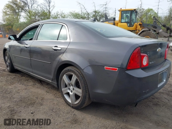 2012 Chevrolet Malibu 1LT with VIN 1G1ZC5E04CF303801, listed as a IAAI auction lot 42112647 with 112,518 mi miles and . Bid and sale history available at DreamBid. Image 3.