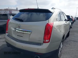 2015 Cadillac SRX Luxury Collection with VIN 3GYFNEE33FS548324, listed as a IAAI auction lot 42029979 with 70,372 mi miles. Bid and sale history available at carsss.com. Image 4.