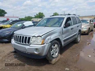 2005 Jeep Grand Cherokee Laredo z VIN 1J4GR48K35C515589, wystawiony jako IAAI lot #42452874 z przebiegiem 253 743 mil mil oraz . Historia ofert i sprzedaży dostępna na DreamBid. Obrazek 12.