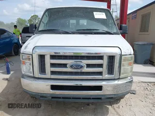 2011 Ford Econoline Cargo Commercial with VIN 1FTNE2EW3BDA57353, listed as a IAAI auction lot 42212797 with 234,806 mi miles and . Bid and sale history available at carsss.com. Image 6.