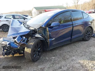 2023 Tesla Model X with VIN 7SAXCDE52PF399834, listed as a IAAI auction lot 41783696 with NaN miles. Bid and sale history available at carsss.com. Image 23.
