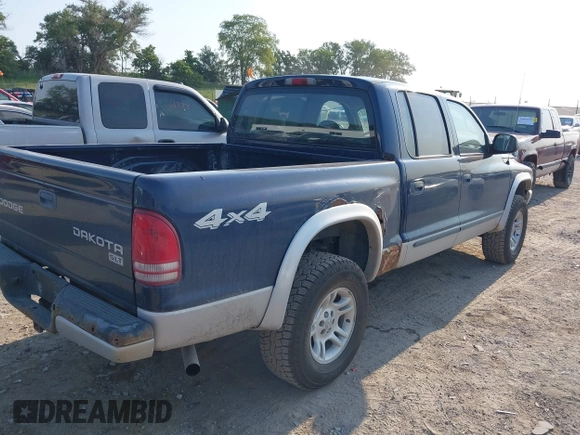2004 Dodge Dakota SLT with VIN 1D7HG48N14S610012, listed as a IAAI auction lot 39853794 with 158,998 mi miles and . Bid and sale history available at carsss.com. Image 4.