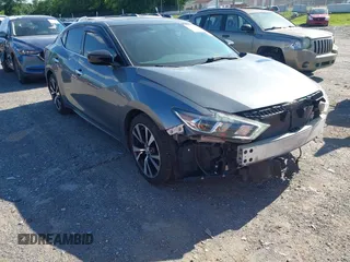 2016 Nissan Maxima SV z VIN 1N4AA6AP4GC428247, wystawiony jako IAAI lot #42296103 z przebiegiem 154 996 mil mil oraz . Historia ofert i sprzedaży dostępna na DreamBid. Obrazek 1.